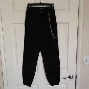 Alcott Black Cargo Pants with Chain Accent.